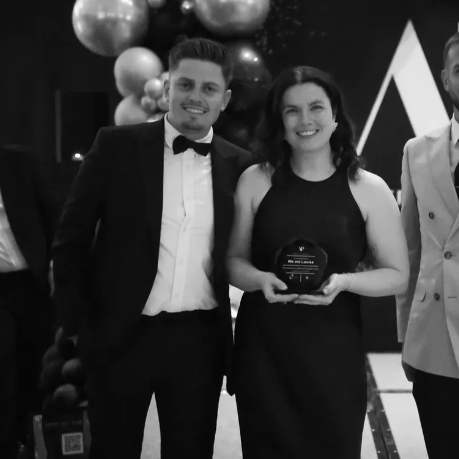 We Are Louise team accepting an award